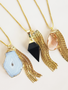Gold Necklace Set Featuring Kelsey Box Chain Necklace Accentuated With Odessa White Agate Slice Pendant, Amiya Crystal Pendant And Lauren Pink Faceted Pendant All Paired With Adelpha Chain Tassel | Mojo Supply Co