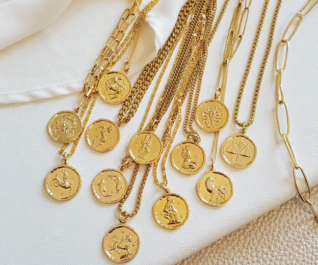 MAKE IT MEANINGFUL | Shop Zodiac Coins, Letters, & Lockets