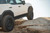 DV8 Offroad 24-25 Toyota Land Cruiser OE Plus Side Steps - Black Steel - SRTL4-01 Photo - out of package