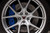 DBA 02-10 WRX / 13+ FR-S / 13+ BRZ Premium Front Drilled & Slotted 5000 Series Rotor w/ Black Hat - DBA5010BLKXS Photo - lifestyle view