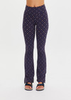 THE UPSIDE women's monogram jacquard Ezra Florence Flare is high-rise with a firm & supportive fit, featuring a V panel waistband and side seam split at hem. Made for yoga and pilates.