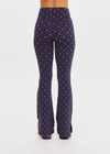 THE UPSIDE women's monogram jacquard Ezra Florence Flare is high-rise with a firm & supportive fit, featuring a V panel waistband and side seam split at hem. Made for yoga and pilates.