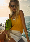 THE UPSIDE women’s organic cotton yellow Fenway Wales Knit Tank has a relaxed fit with ribbed neckline and armholes in an open knit. Made for everyday wear.