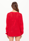 THE UPSIDE women's red organic cotton Fenway Sebastion Knit Crew has a relaxed fit with ribbed neckline and cuffs, and a logo knit detail on the back. Made for everyday wear.