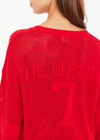 THE UPSIDE women's red organic cotton Fenway Sebastion Knit Crew has a relaxed fit with ribbed neckline and cuffs, and a logo knit detail on the back. Made for everyday wear.