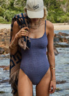 THE UPSIDE women's purple check Aliki Flow Onepiece has low coverage with a scoop front and back neckline and adjustable elastic straps. Made for swim.
