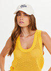 THE UPSIDE women’s cream Good Luck Soft Cap features an embroided 'Good Luck' on front with an adjustable strap at the back.