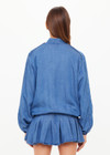 THE UPSIDE women’s blue denim Lykke Lexi Bomber Jacket, in a soft chambray fabrication, is made for a relaxed fit. This zip-through jacket features front pockets with branded tortoiseshell buttons.