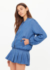 THE UPSIDE women’s blue denim Lykke Lexi Bomber Jacket, in a soft chambray fabrication, is made for a relaxed fit. This zip-through jacket features front pockets with branded tortoiseshell buttons.