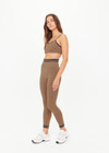 THE UPSIDE women’s mocha recycled Form Seamless Kelsey Bra is a double-layer mocha bra with navy contrast and moisture control. Made for yoga and pilates.