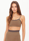 THE UPSIDE women’s mocha recycled Form Seamless Kelsey Bra is a double-layer mocha bra with navy contrast and moisture control. Made for yoga and pilates.