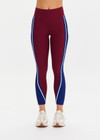 THE UPSIDE women’s maroon Adesa 25In High Midi Pant in recycled rib features a V-panel waistband and moisture-wicking properties. Made for high impact.