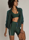 THE UPSIDE women’s green eco tech Maneki 5In Spin Short offers a supportive, comfortable fit with elastic drawcord waist and quick-dry breathable fabric. Made for lifestyle.