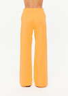 THE UPSIDE women’s lightweight yellow Juliet Pant features a low-rise fit with contrast binds and split hem detail. Perfect for travel and everyday wear.