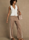 THE UPSIDE women’s mocha lightweight Juliet Pant has a low-rise fit with contrast binds and split hem detail. Perfect for travel and everyday wear.