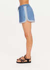 THE UPSIDE women's blue Klio Short is designed for a mid-rise, relaxed fit and features a soft elasticated waistband with drawcord and contrast binds in cream along curved hem. Made for everyday.