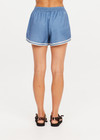 THE UPSIDE women's blue Klio Short is designed for a mid-rise, relaxed fit and features a soft elasticated waistband with drawcord and contrast binds in cream along curved hem. Made for everyday.