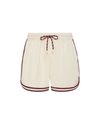 THE UPSIDE women's cream Klio Short is designed for a mid-rise, relaxed fit and features a soft elasticated waistband with drawcord and contrast binds in maroon along curved hem. Made for everyday.