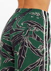THE UPSIDE women's floral Tamara Juliet Pant is low-waisted with split hem detail and contrast cream side binding. Made for everyday.