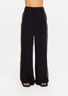 THE UPSIDE women's black Haveli Wide Leg Pant is true to size with a structured waistband, fly zipper, belt loops, and cream embroidered side seams. Made for lifestyle.