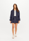 THE UPSIDE women's check Valencia Lexi Collared Jacket is relaxed fit with zip-through bomber style, collar, and front flap pockets with antique brass buttons. Made for lifestyle.