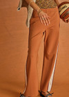 THE UPSIDE women's orange Lenzing viscose Marnie Wide-Leg Pant has a true-to-size fit with a high-rise elasticated waistband and welt pockets. Made for lifestyle.