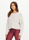 THE UPSIDE women's natural wool blend Xanthe Crew Neck Knit Sweater has a relaxed fit with cable knit and decorative blanket stitching. Made for lifestyle.