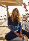 THE UPSIDE women's tie dye organic cotton Seeker Amana Long Sleeve Knit is designed for a regular fit and features a ribbed neckline. Made for lifestyle.