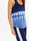 THE UPSIDE women's tie dye organic cotton Seeker Emma Knitted Tank Top is designed for a regular fit and features a tonal ribbed neckline and armholes. Made for lifestyle.