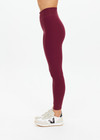THE UPSIDE women's maroon recycled peached 25 Inch Midi Pant is designed for a soft and supportive fit and features a mid-rise and moisture-wicking. Made for yoga and pilates.