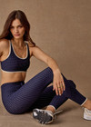 THE UPSIDE women's polka dot Spellbound 25inch Legging is supportive and comfortable with recycled rib fabric, elastic drawcord, and cream aglet ends. Made for yoga & pilates.