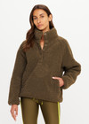 THE UPSIDE women's green recycled polyester Harlow Fleece Pullover is designed for a relaxed fit and features a quarter snap button opening and zip pockets. Made for lifestyle.