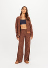 THE UPSIDE women's leopard organic cotton Malawi Margot Knit Jacket offers a regular fit and features front pockets and a ribbed waistband. Made for lifestyle.