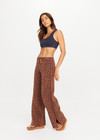 THE UPSIDE women's leopard organic cotton Malawi Freya Knit Pant is true-to-size and features a elasticated waistband with drawcord and short splits at hem. Made for everyday.