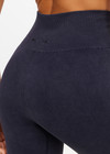 THE UPSIDE women's black Seamless 25inch Midi Pant has a mid-rise waist in rib fabrication. Made for yoga & pilates.