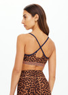 THE UPSIDE women's leopard Malawi Badu Crossback Bra offers soft & supportive fit with a scooped front neckline, crossback straps and removable cups. Made for yoga & pilates.