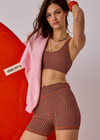 THE UPSIDE women's orange & navy check Solaris Harley Scoop Bra is supportive & comfortable and features a scoop front and back neckline with removable cups. Made for yoga & pilates.