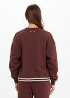 THE UPSIDE women's brown organic cotton Toluca Lisel Crew Neck Sweater offers a relaxed fit with a dropped shoulder and features a ribbed neckline and cuffs. Made for lifestyle.