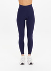 THE UPSIDE women's navy recycled peached Maison 25inch Midi Pant is mid-rise and features cream scalloped edge trim at hem. Made for yoga & pilates.