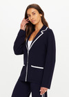 THE UPSIDE women's navy Monte Carlo Alix Knit Blazer fits true-to-size and features contrast white edge along collar and placket and patch pockets at front. Made for lifestyle.