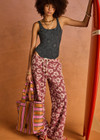 THE UPSIDE women's pink floral organic cotton Lahaina Charli Drawstring Pant has a low-rise straight leg fit with a soft elasticated waistband with drawcord. Perfect for everyday or holiday.