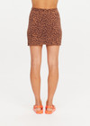 THE UPSIDE women's leopard organic cotton Malawi Karly Knit Mini Skirt offers a relaxed fit, featuring an elasticated waistband with orange drawcord and knitted stripes down sides. Made for lifestyle.