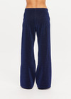 THE UPSIDE women's navy Galaxia Loretta Pant is designed for a mid to low rise fit and features elasticated waistband, drawcord with side seam pockets and knitted tape down sides. Made for lifestyle.