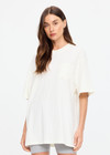 THE UPSIDE women's cream organic cotton Big Beach Tee is an oversized crew neck tee with a ribbed neckline and "dust yourself down" horseshoe artwork printed at back. Made for lifestyle.