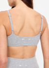 THE UPSIDE women's grey cotton Flash Scoop Neck Sports Bra offers low coverage with a scooped sweetheart neckline, soft support, and binded straps with adjusters. Made for yoga & pilates.