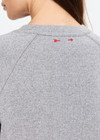 THE UPSIDE women's grey cotton Hit The Road Track Top is a relaxed raglan crew neck sweater in french terry fabrication with a ribbed neckline, arms and cuffs. Made for lifestyle.