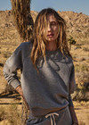 THE UPSIDE women's grey cotton Hit The Road Track Top is a relaxed raglan crew neck sweater in french terry fabrication with a ribbed neckline, arms and cuffs. Made for lifestyle.