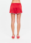 THE UPSIDE women's red 100% silk Run For Your Life Silk Short is a low-rise fit with a soft elastic waistband and cream piping along side seams. Made for lifestyle.