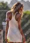 THE UPSIDE women's cream Lyon Pia Racerback Dress is a fitted stretch lace tennis dress with a high neck, A-line skirt and internal bodysuit with inner shorts and pockets. Made for tennis, golf & pickleball.