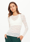 THE UPSIDE women's cream Lyon Rosa Long Sleeve Top is a fitted, sheer lace style with a crew neckline. Made for everyday wear and layering.